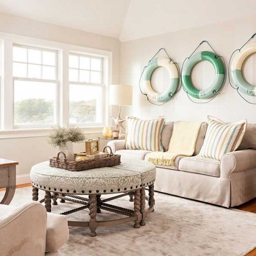 dining room with coffee table and ring buoys in Orleans MA