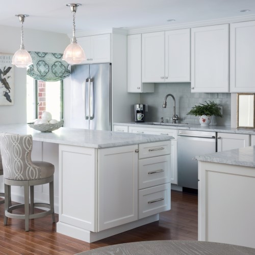 modern kitchen with island and chairs in Humarock MA